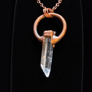 Back view of Quartz Crystal Copper Pendant showing the copper setting and clear quartz crystal.