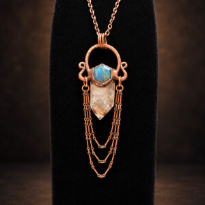 Rutilated quartz copper pendant with hexagonal labradorite and three draped chain accents