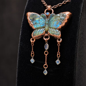 Labradorite butterfly pendant showing blue and green flash