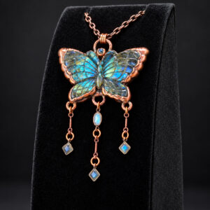 Labradorite butterfly pendant showing blue and green flash