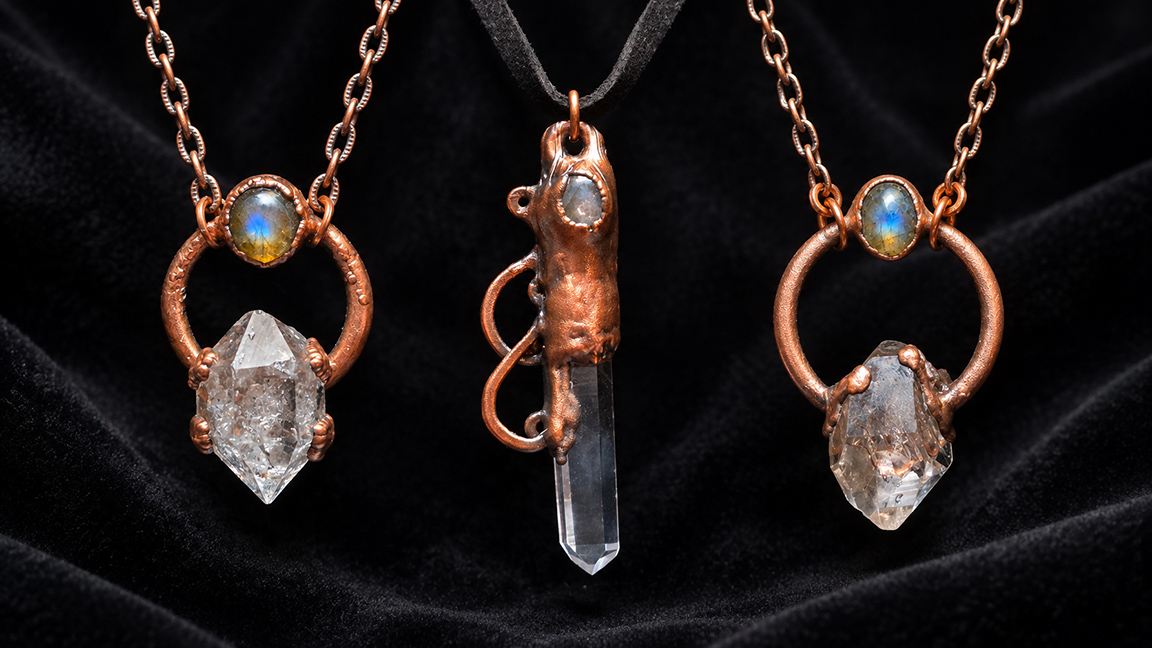 Three copper crystal pendants with Herkimer Diamonds, quartz, and labradorite