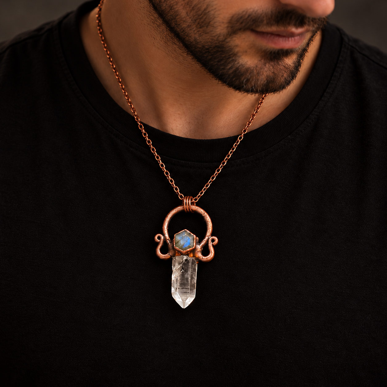 Lemurian Quartz Labradorite Pendant from the Keys to the Castle Collection worn by a male model in black.