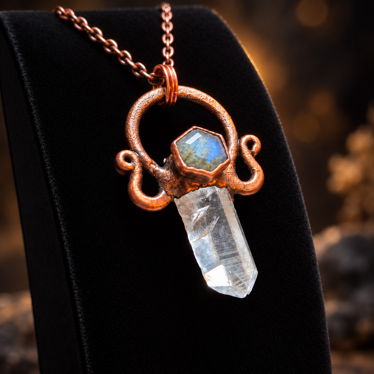 Close-up angled view of a Lemurian Quartz Labradorite Pendant with faceted blue labradorite and sculptural copper.