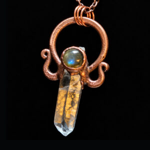 Blue Window Quartz Labradorite Pendant Detail Close-up of blue-flashy labradorite, natural quartz, and sculptural copper on a Keys to the Castle pendant.